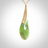 This matau is carved from a very striking New Zealand jade. 